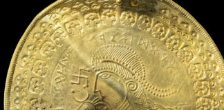 Gullmynt med eit andlet og runeinskripsjon